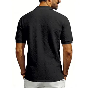 Back view detail of a black short sleeve polo shirt featuring a heavy textured herringbone pattern