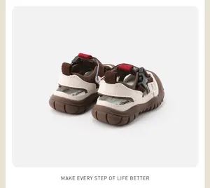 Rear view of breathable baby outdoor sandals with brown soft rubber soles.