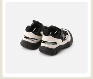Rear view of black and beige breathable toddler sandals with non-slip soft rubber soles