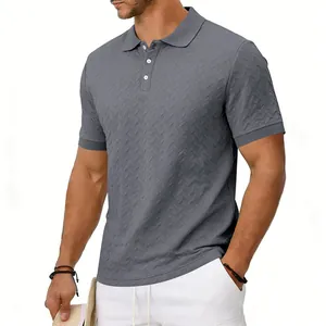 Close-up detail of a heavyweight grey polo shirt with a unique jacquard texture