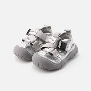 Breathable grey toddler walking sandals with soft anti-slip soles and Velcro straps
