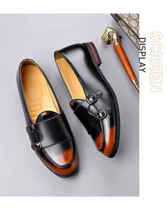 Detailed view of men's vintage double monk strap leather shoes in black and tan