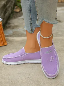 Stylish purple canvas slip-on shoes for women with trendy frayed edge detail design