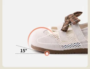 Close-up detail of child's shoe showing the 15-degree anti-collision curved sole design.