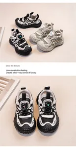 Detail view of boys' breathable mesh sneakers with distinctive tire-pattern soles