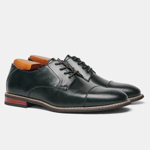Detailed view of classic black men's business dress shoes with wooden shoe trees