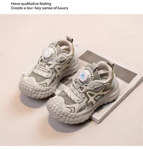 Detailed view of breathable mesh kids' sneakers with rotary dial lacing system