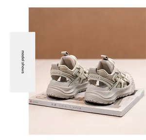 Close-up of boys' breathable chunky sports sandals with reinforced heel and mesh details.