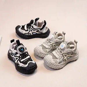 Breathable mesh boys sports sneakers featuring rugged tire sole and easy rotary buckle.