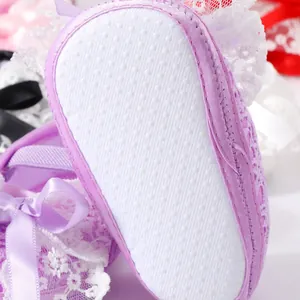 Purple lace baby formal shoes with soft non-slip sole for newborns aged 0 to 1 year old.
