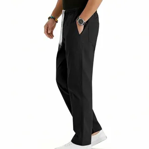 Detailed side view of men's black straight-leg pants with a white drawstring waist