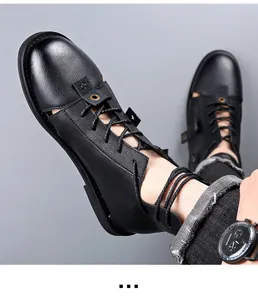 Close-up of premium black leather Roman sandals featuring a stylish cutout design and laces