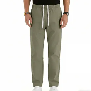Macro view of men's olive green casual straight-leg trousers with white drawstring waist