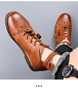 Macro view of vintage brown leather hollow-out Roman high-top sandals with back zipper