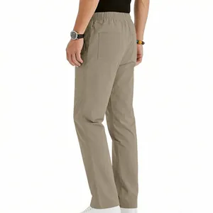 Detail shot of men's khaki casual trousers featuring back pocket and elastic waist