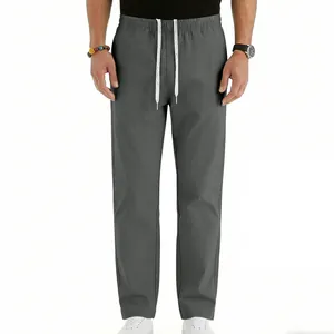 Detailed front view of men's grey casual drawstring trousers with elastic waistband