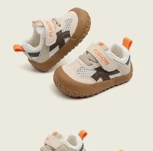 Detail view of breathable mesh toddler walking shoes with soft anti-slip soles