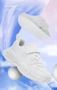 Detailed macro view of breathable white boys' sports shoes with soft flexible soles.