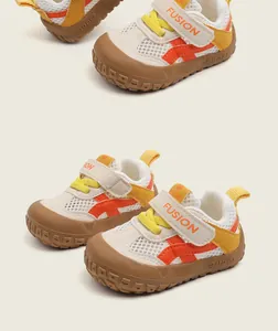 Macro view of breathable toddler walking shoes with anti-collision rubber toe caps