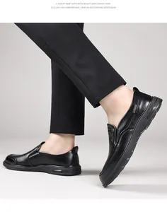 Detail of men's black hollow leather loafers for business casual wear in summer.