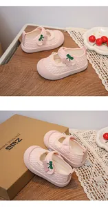 Detailed view of pink breathable mesh baby girl princess shoes with decorative cherry