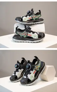 Detailed views of black and grey boys' outdoor sandals on display stands