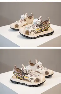 Detailed view of children's outdoor sandals featuring a rotary buckle and breathable mesh.
