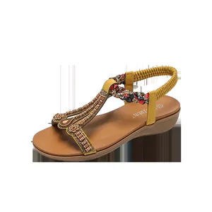 Eleganti sandali con zeppa gialli bohémien con cinturino elastico e strass luccicanti