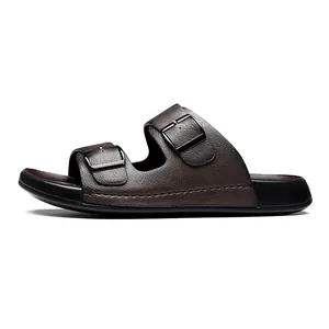 Vue latérale de sandales pour hommes en similicuir marron avec doubles boucles noires