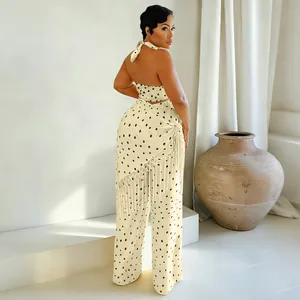 Ensemble chic deux pièces à pois pour femme avec haut licou et pantalon à franges
