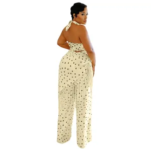 Vue détaillée du dos d'un ensemble haut dos nu à pois et pantalon à franges
