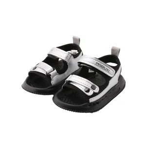 Sandales pour bébé antidérapantes en noir et argent avec fermetures velcro pratiques
