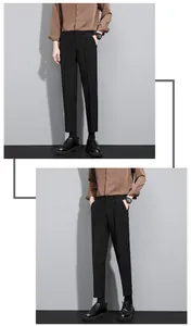 Professional display of men's slim-fit black cropped dress pants for business casual look