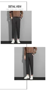 Detailed view of charcoal grey men's slim business trousers featuring a professional drape