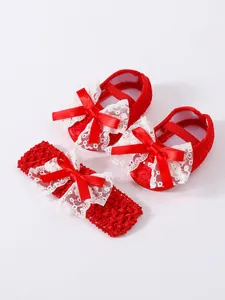 Red baby shoes and matching headband set with white lace and satin bows