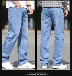 Detailed view of men's loose straight-leg light blue jeans from side and back