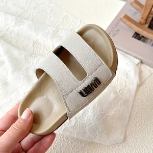 Beige children's H-strap breathable sandals with thick tan sole and metal buckle