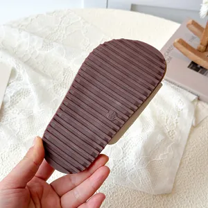Anti-slip sole detail of kids' breathable Birkenstock style sandals for summer beach wear