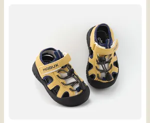 Close-up detail of yellow breathable baby outdoor sandals with soft non-slip soles