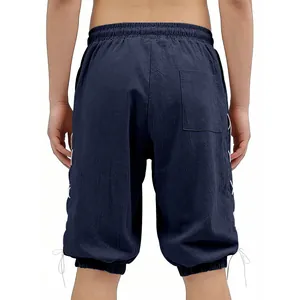 Detailed view of navy blue Viking lace-up shorts featuring back pocket and side ties.