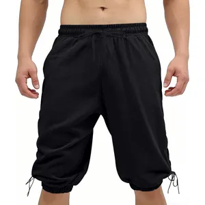 Close-up of black men's medieval vintage viking shorts with drawstring and lace-up leg details