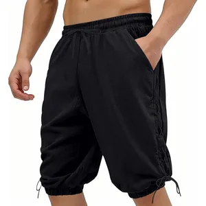 Detail shot of men's medieval viking lace-up shorts in black textured fabric