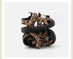 Stacked side view of infant leopard print sandals showing closed-toe protective design