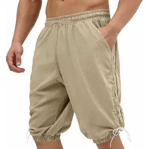 Men's loose linen three-quarter pants with drawstring waist and lace-up side detail