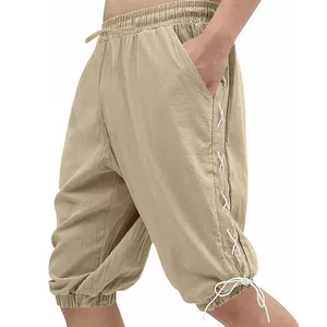 Detail view of men's medieval Viking lace-up shorts in khaki linen-style fabric