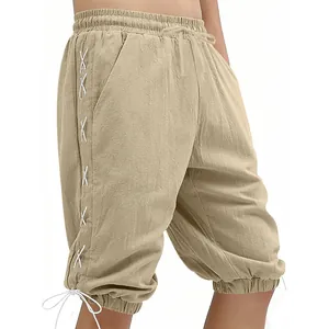 Detail of men's medieval viking shorts in khaki with side lacing and elastic cuffs