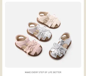 Close-up showing the lace bow detail and color options for toddler girl sandals
