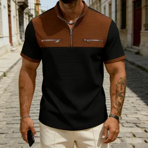 Detailed macro view of men's color-block waffle polo shirt with stylish chest zipper pockets