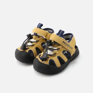 Toddler outdoor sandals with closed-toe design and non-slip rubber soles in yellow.