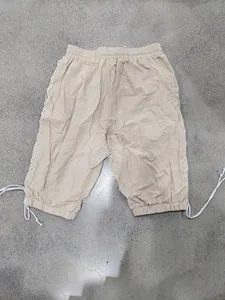 Detail view of the back pocket and side lacing on medieval Viking style shorts